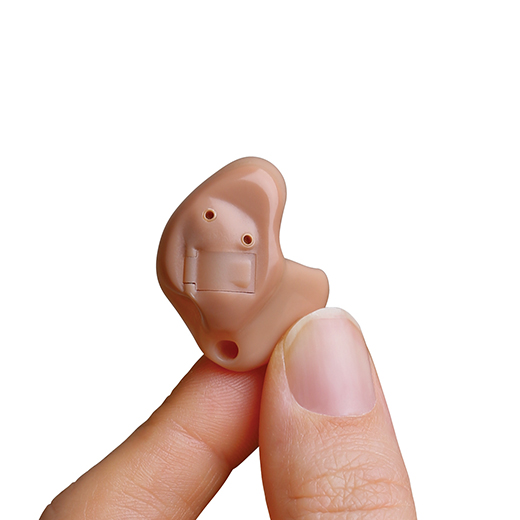 In the ear hearing aid in hand